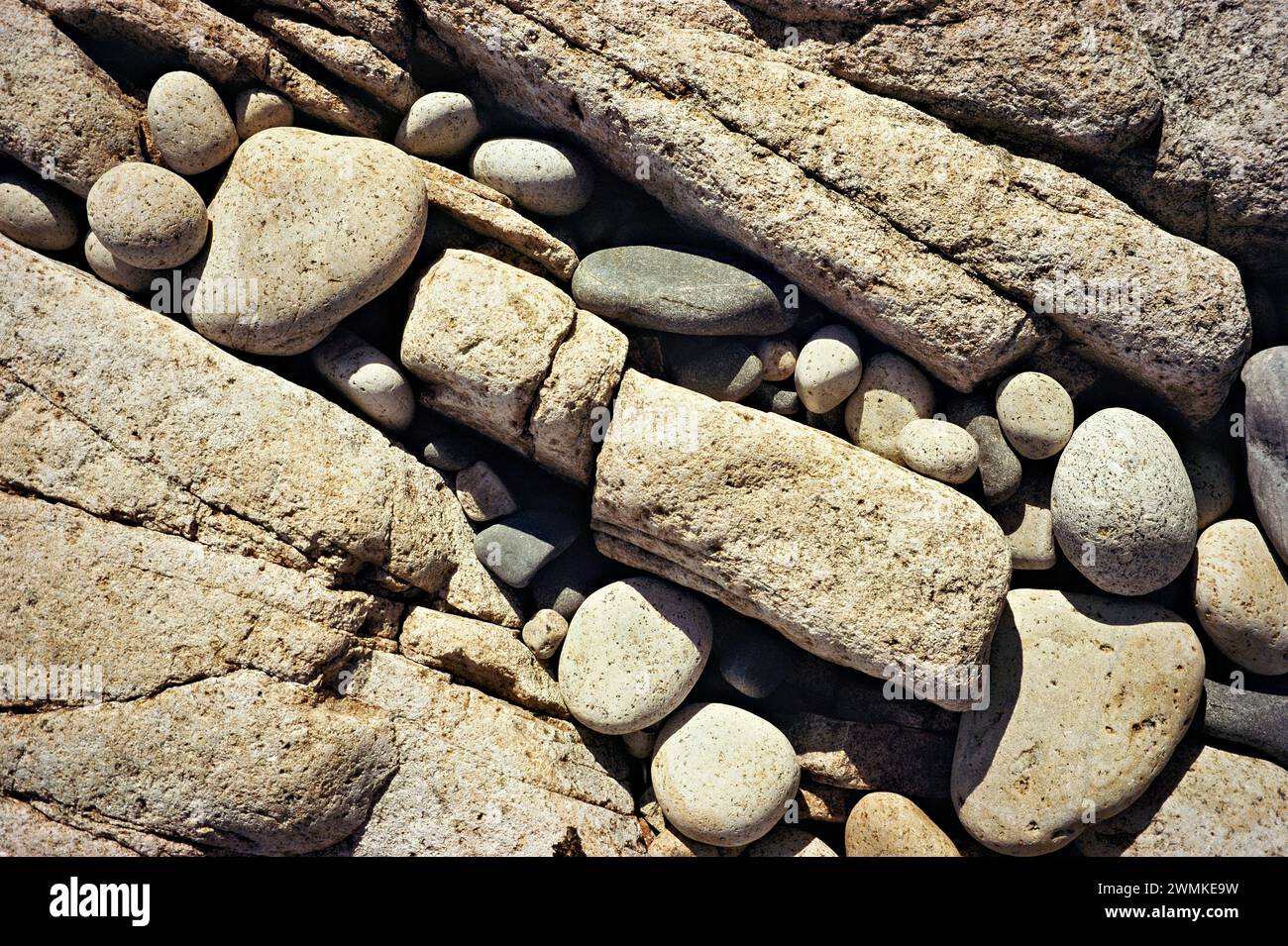 Close views of rock eroded on the coast of Hero Beach on Swans Island, Maine, USA; Swans Island, Maine, United States of America Stock Photo