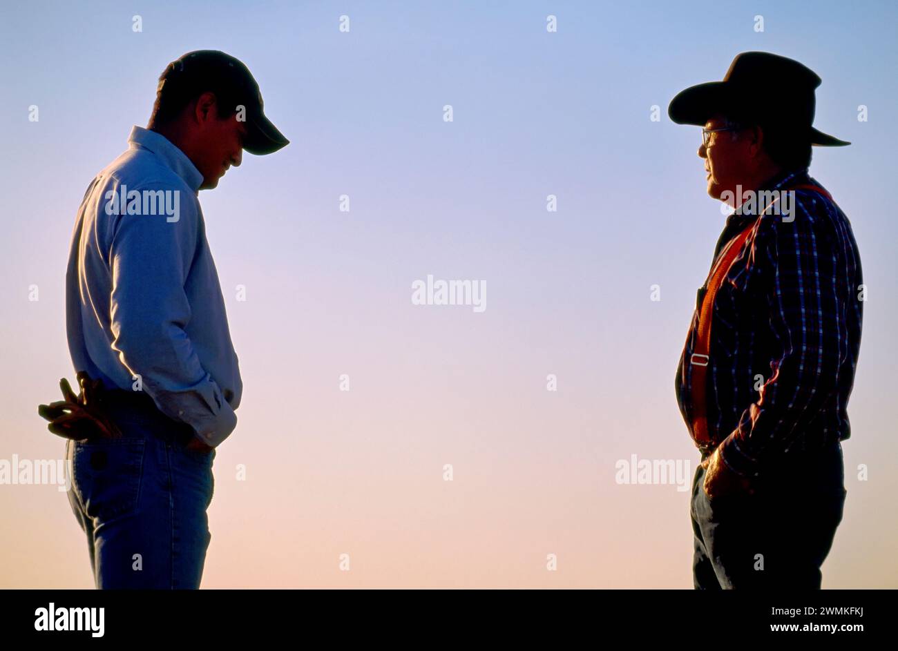 Father and son work together on their ranch; Howes, South Dakota ...