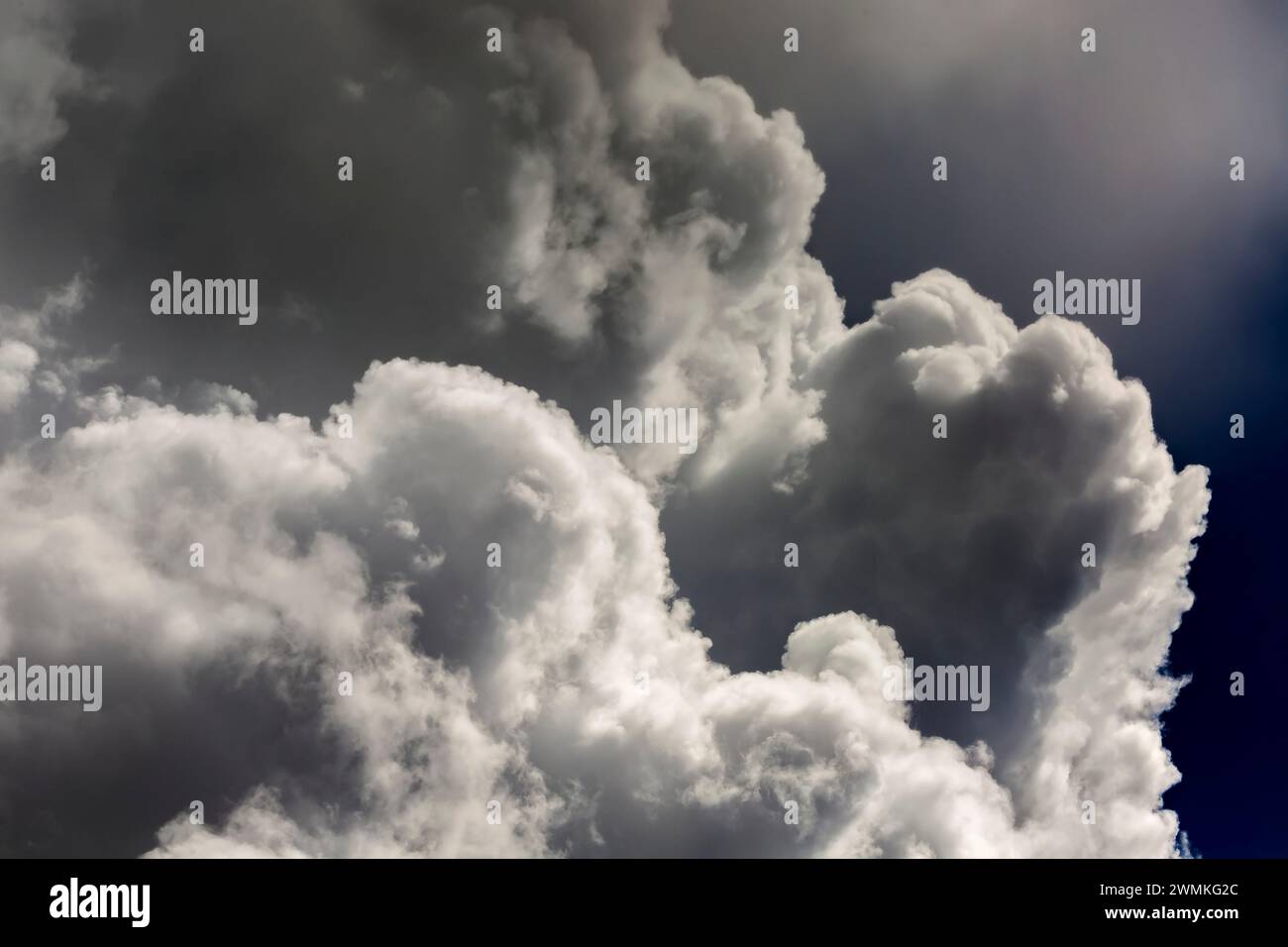 Dramatic close-up of billowing storm clouds in a dark sky; Calgary, Alberta, Canada Stock Photo