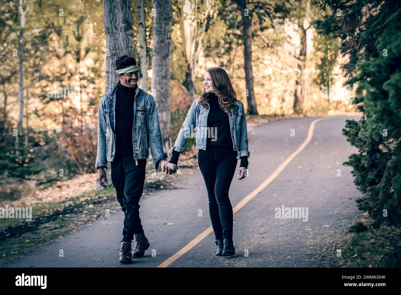 Young black couple walking down hi-res stock photography and images - Alamy