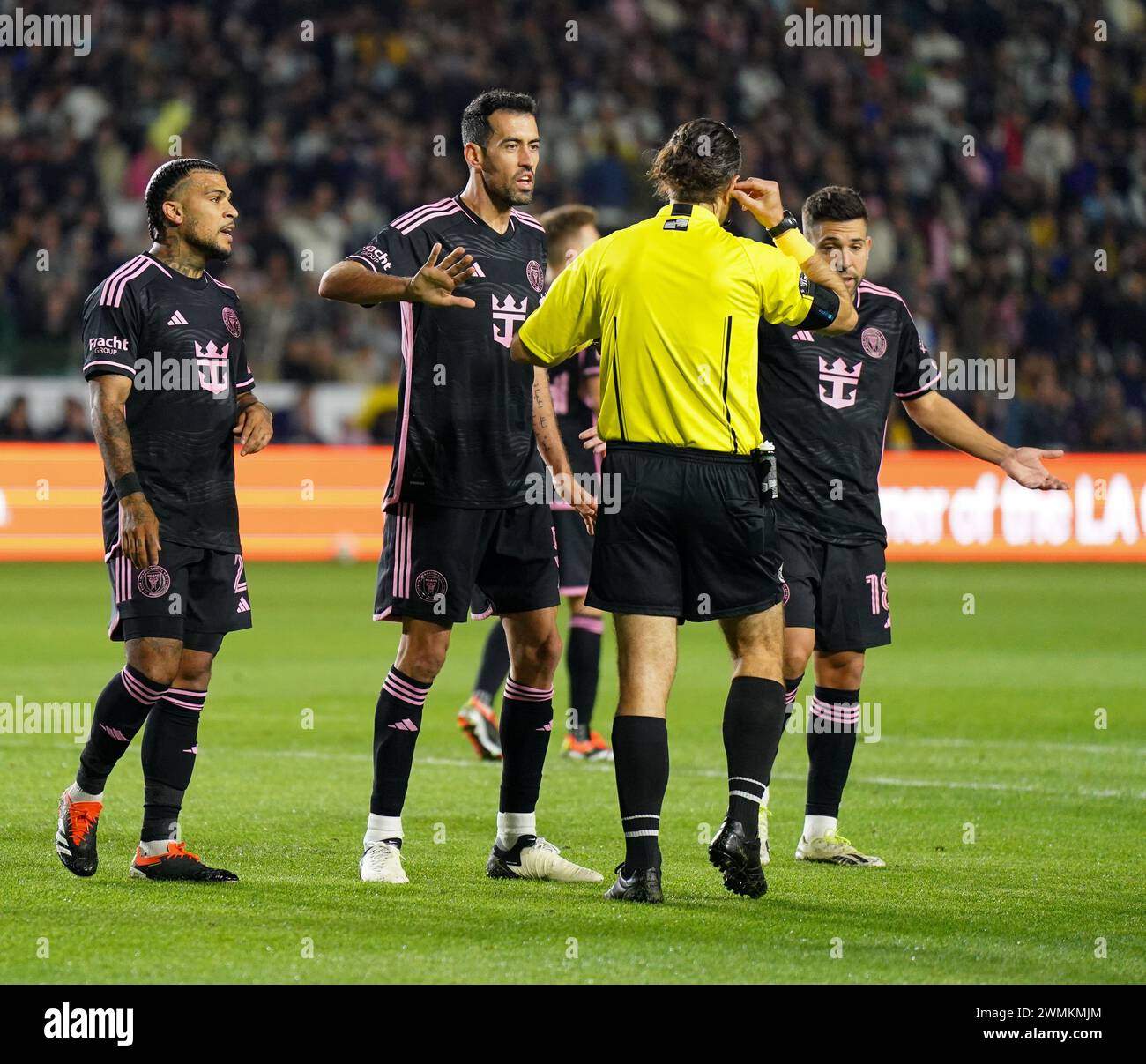 Carson, California, USA. 25th Feb, 2024. Inter Miami defender DEANDRE YEDLIN (2), Inter Miami midfielder SERGIO BUSQUETS (5), Inter Miami defender JORDI ALBA (18) argue a penalty kick with the referee during the first half at their match against Los Angeles Galaxy at Dignity Health Sports Park. (Credit Image: © Jose Moreno/ZUMA Press Wire) EDITORIAL USAGE ONLY! Not for Commercial USAGE! Stock Photo