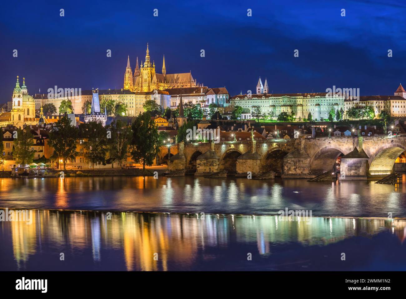 Prague Czech Republic, night city skyline at Charles Bridge Vltava River and Prague Castle, Czechia Stock Photo