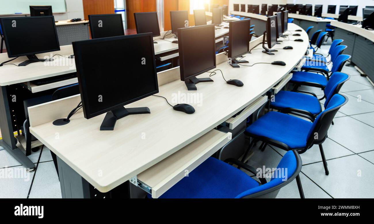 Group of computer in computer lab Stock Photo - Alamy