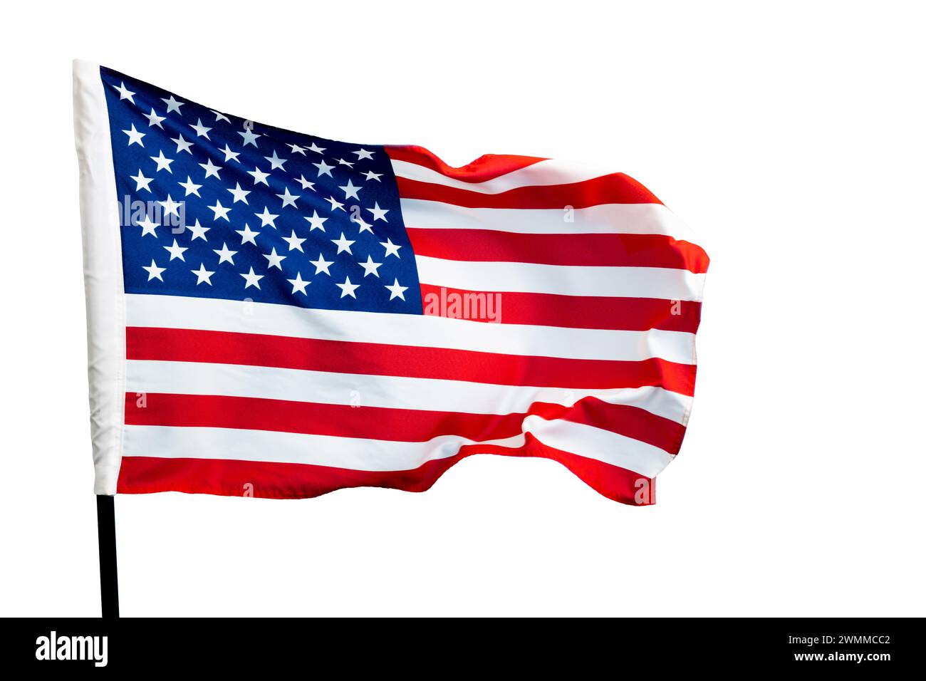 American flag waving against white sky background Stock Photo Alamy