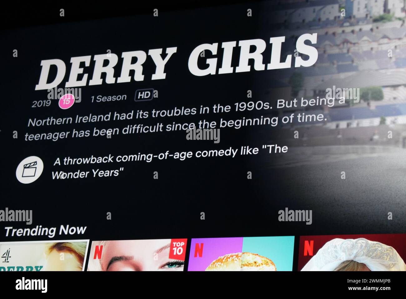 London, UK - May 1, 2022: Netflix app on tv screen showing the popular Northern Irish teen sitcom Derry Girls Stock Photo