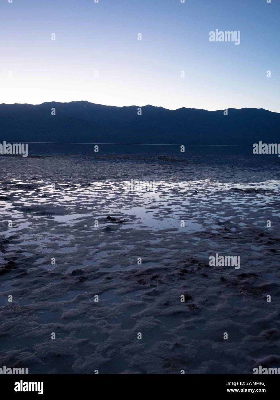 Lake at Badwater Basin, Death Valley National Park at twilight Stock ...