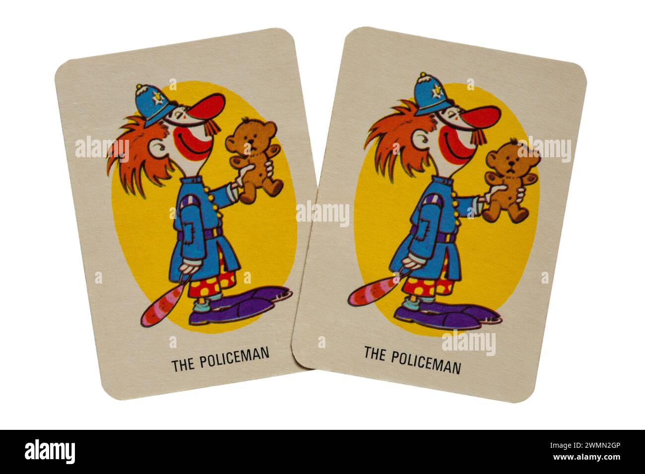 pair of old retro The Policeman cards from pack of Donkey playing cards isolated on white background - UK Stock Photo