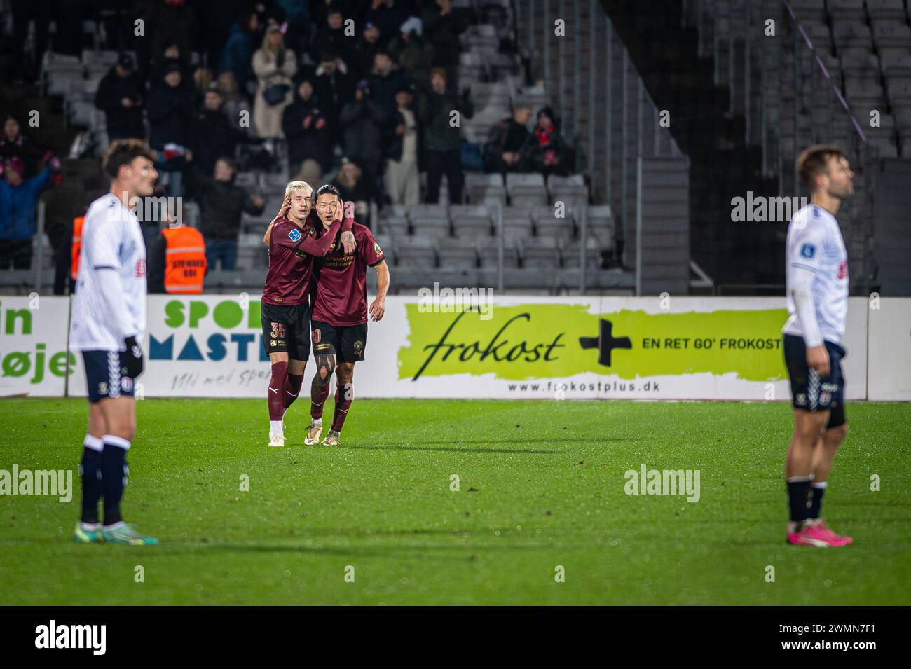 Aarhus, Denmark. 25th, February 2024. Charles (35) of FC Midtjylland scores for 2-3 and celebrates with Cho Gue-sung (10) during the 3F Superliga match between Aarhus GF and FC Midtjylland at Ceres Park in Aarhus. (Photo credit: Gonzales Photo - Morten Kjaer). Stock Photo