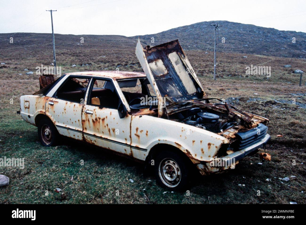 Scrapped car, Dursey Island, Beara Peninsula, County Cork, Republic of Ireland, April 1996 Stock Photo