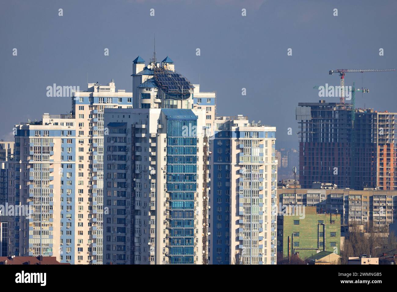 The concept of ecological energy sources for a multi-storey residential building. Stock Photo