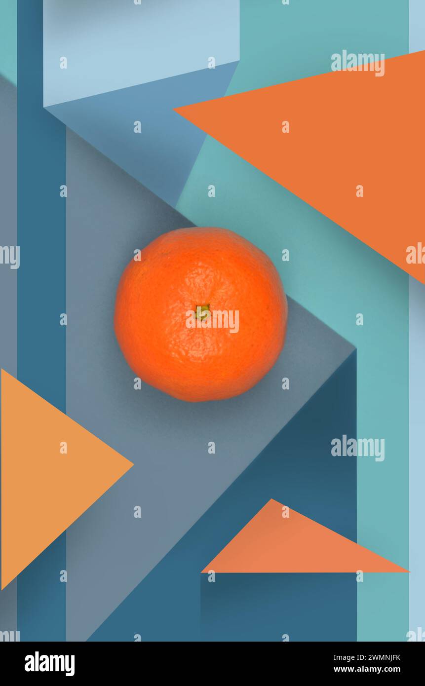 Abstraction, food is art, photo mixed with graphics:orange tangerine on triangle and square background. Stock Photo