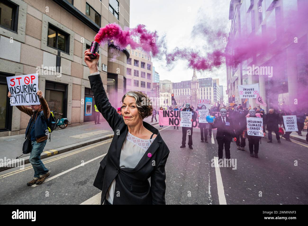 London, UK. 27th Feb, 2024. An Extinction Rebellion Insure Our Future Rally & March in the City of London. They are trying to encourage insurers to pledge not to insure new carbon related projects. Credit: Guy Bell/Alamy Live News Stock Photo