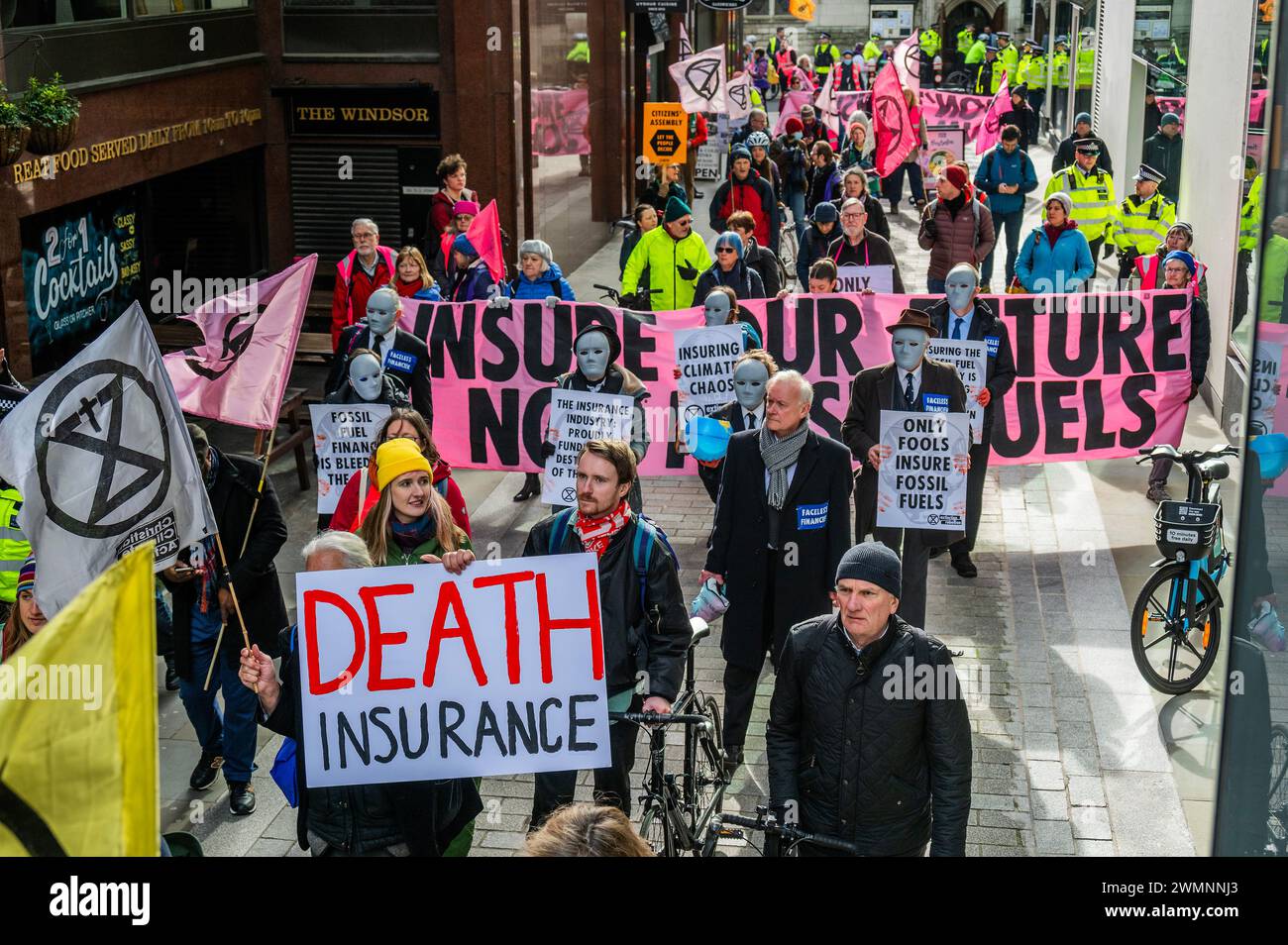 London, UK. 27th Feb, 2024. An Extinction Rebellion Insure Our Future Rally & March in the City of London. They are trying to encourage insurers to pledge not to insure new carbon related projects. Credit: Guy Bell/Alamy Live News Stock Photo