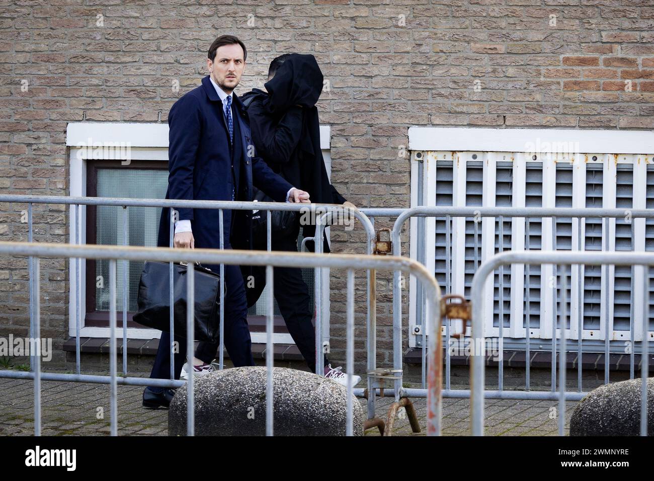AMSTERDAM - Lawyer Max den Blanken leaves the extra-secure court after ...