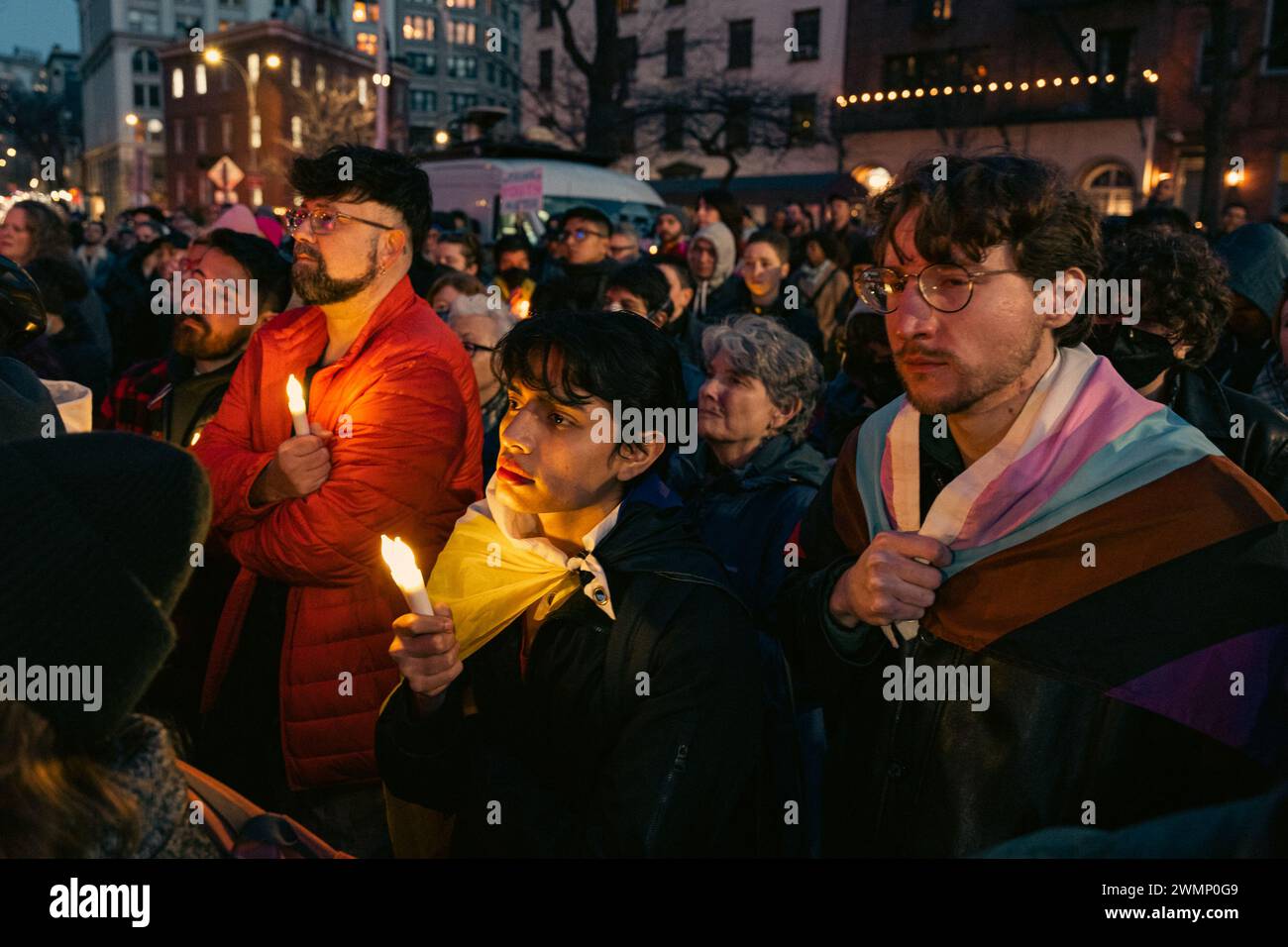 People hold a vigil outside The Stonewall Inn to mourn the death of ...
