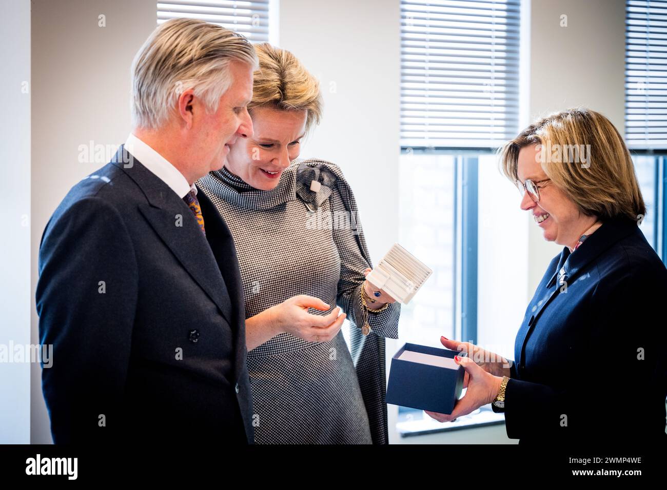 King Philippe - Filip of Belgium, Executive Director of Europol Catherine De Bolle and Queen Mathilde of Belgium pictured during a royal visit to the Europol headquarters in The Hague, the Netherlands, Tuesday 27 February 2024. Europol is the European police agency tasked with helping the Member States of the European Union to prevent and combat all forms of serious organised and international crime, cybercrime and terrorism. The visit will explain the agency's work and how it operates, before a meeting with Belgians who work there. BELGA PHOTO JASPER JACOBS Stock Photo