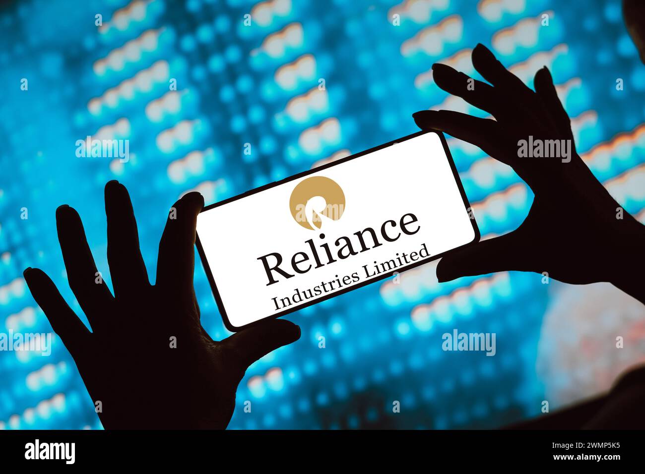 In this photo illustration, the Reliance Industries Limited logo is displayed on a smartphone screen. Stock Photo