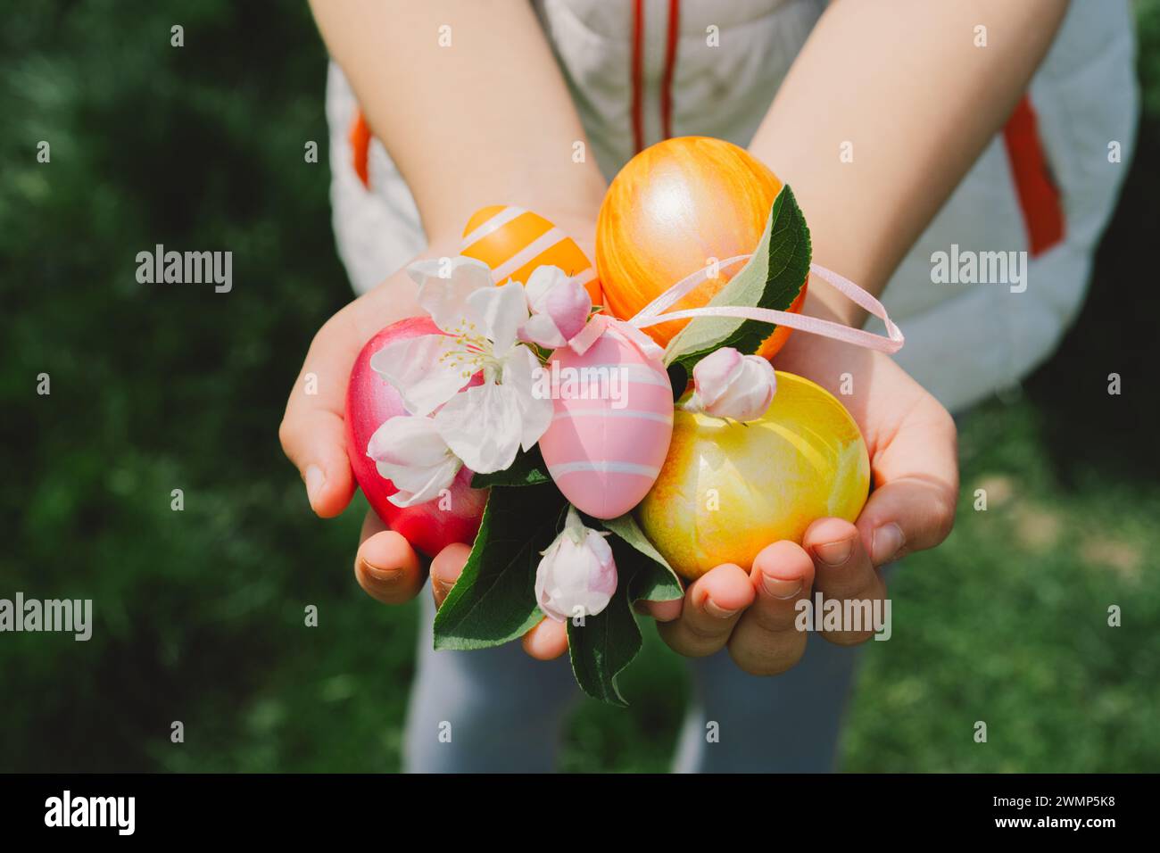 Child Holding Easter Eggs Hunting For Easter Eggs Stock Photo Alamy