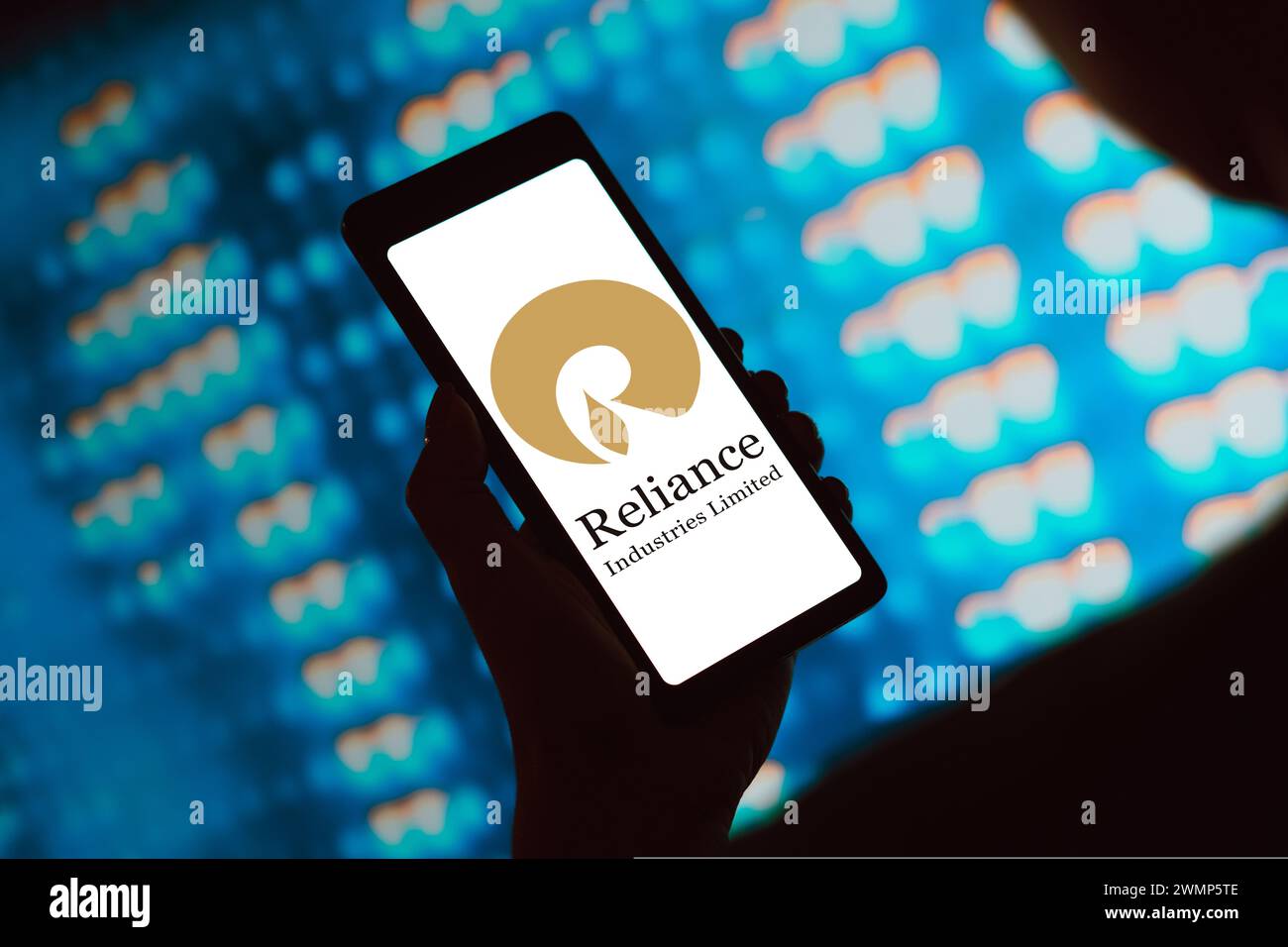 In this photo illustration, the Reliance Industries Limited logo is displayed on a smartphone screen. Stock Photo