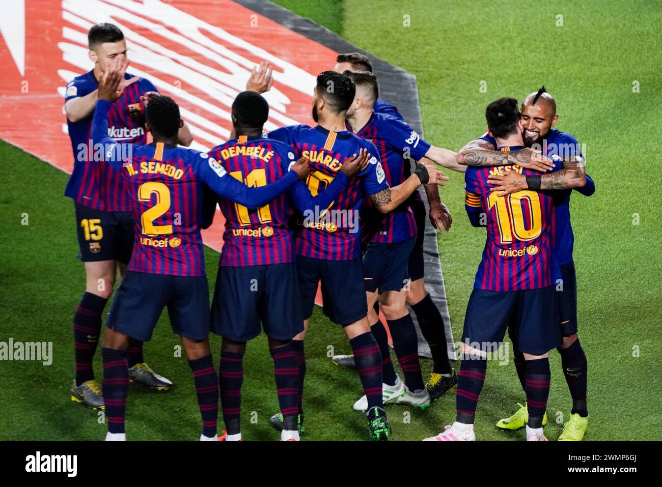 LIONEL MESSI, VIDAL, GOAL CELEBRATION, BARCELONA FC, 2019: Lionel Messi scores the winning goal in the 62nd minute and is hugged by Arturo Vidal as his teammates celebrate. The final game of the La Liga 2018-19 season in Spain between Barcelona FC and Levante at Camp Nou, Barcelona on 27 April 2019. Barca won the game 1-0 with a second half Messi goal to clinch back-to-back La Liga titles and their eighth in 11 years. Stock Photo