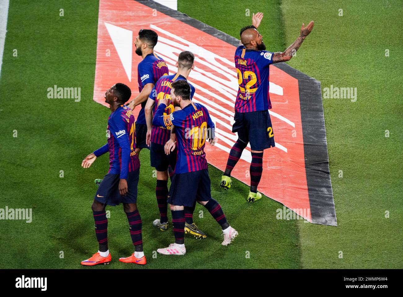 LIONEL MESSI, BARCELONA FC, 2019: Lionel Messi scores the winning goal in the 62nd minute and celebrates with his teammates as Vidal fires up the crowd. The final game of the La Liga 2018-19 season in Spain between Barcelona FC and Levante at Camp Nou, Barcelona on 27 April 2019. Barca won the game 1-0 with a second half Messi goal to clinch back-to-back La Liga titles and their eighth in 11 years. Stock Photo