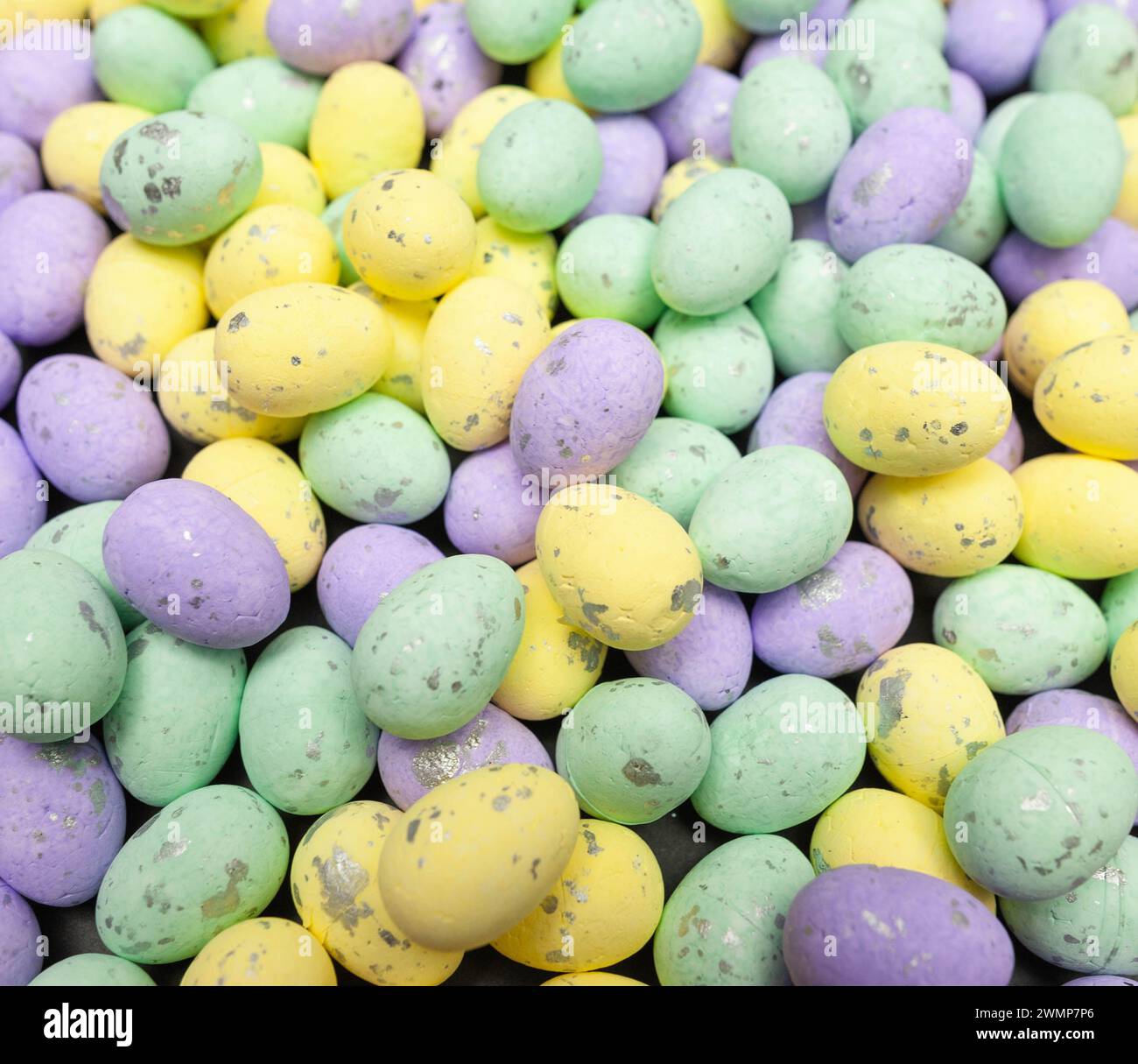 Colourful easter eggs on black background. Creative easter composition, spring. Stock Photo