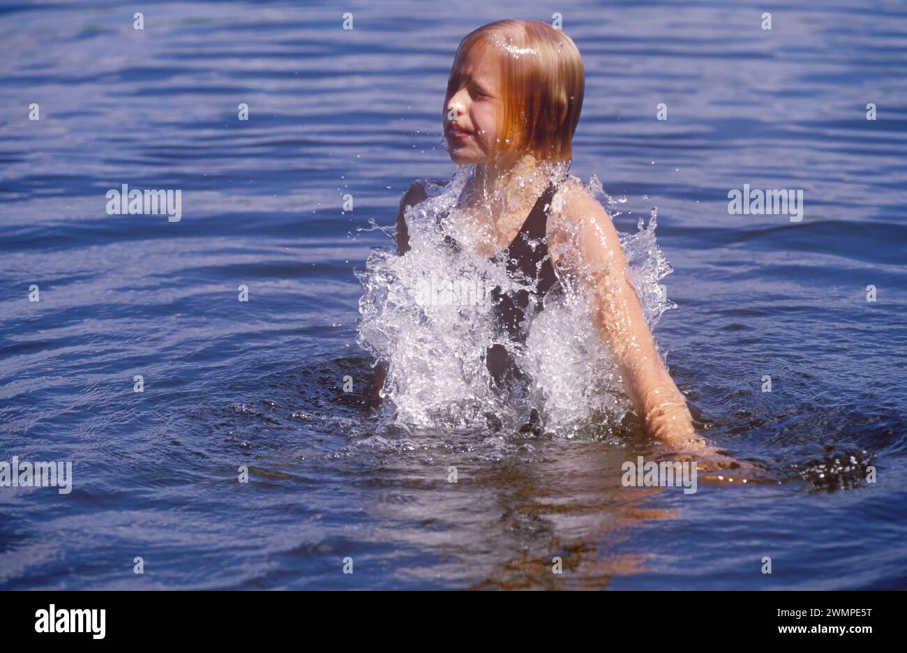 Young girl bathing Stock Photo