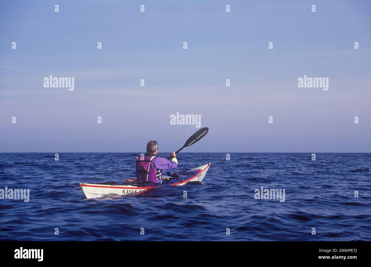 Kayaking on open sea Stock Photo