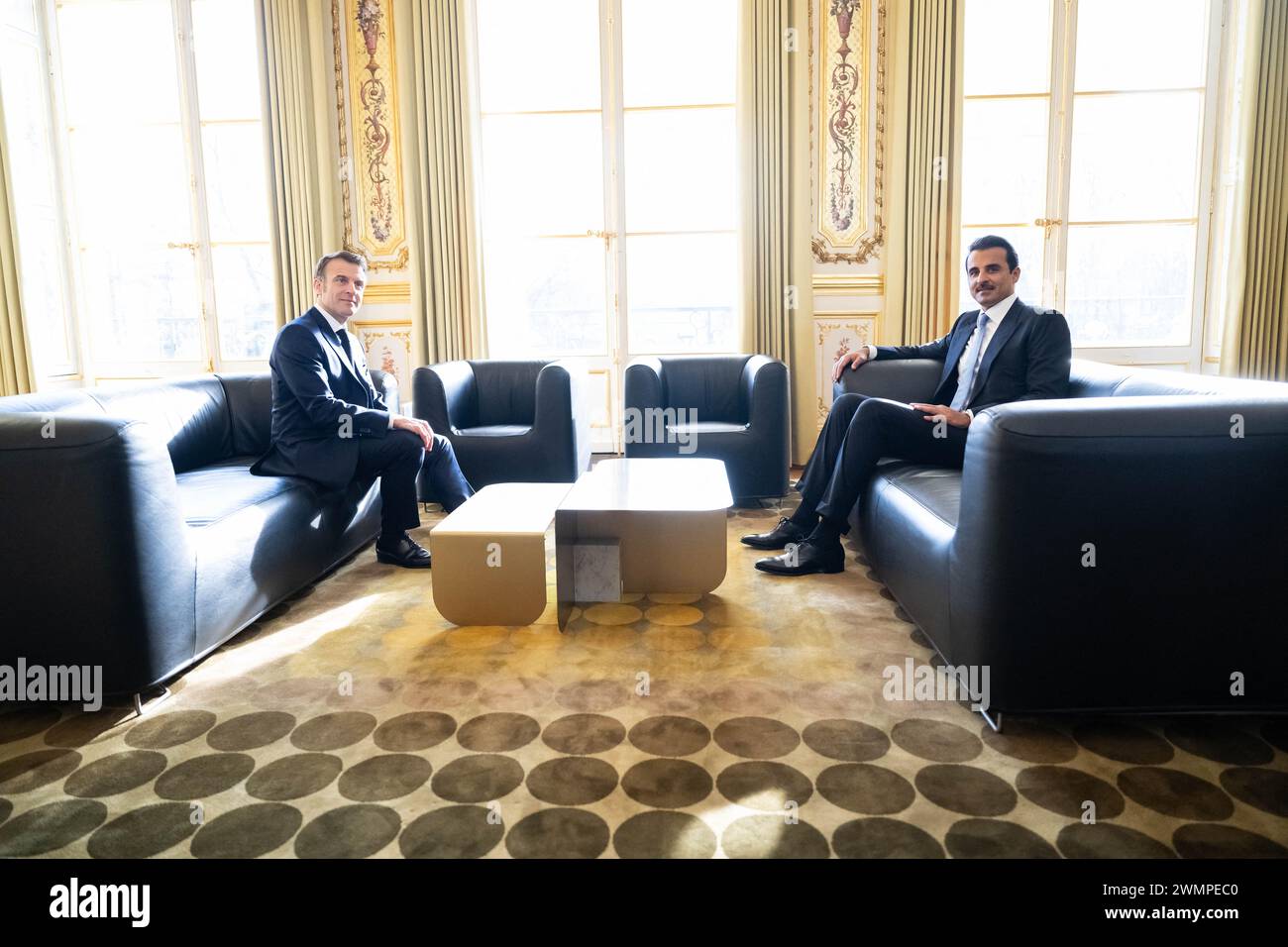 Paris, France. 27th Feb, 2024. French President Emmanuel Macron meets with Qatar's Emir Sheikh Tamim bin Hamad al-Thani at the Elysee Palace, in Paris, France on February 27, 2024. Macron and the Emir of Qatar take stock of current efforts to secure a ceasefire and the release of hostages in Gaza, as well as ways of speeding up the implementation of a Palestinian state in order to bring a lasting end to the conflict. Photo by Eric Tschaen/Pool/ABACAPRESS.COM Credit: Abaca Press/Alamy Live News Stock Photo