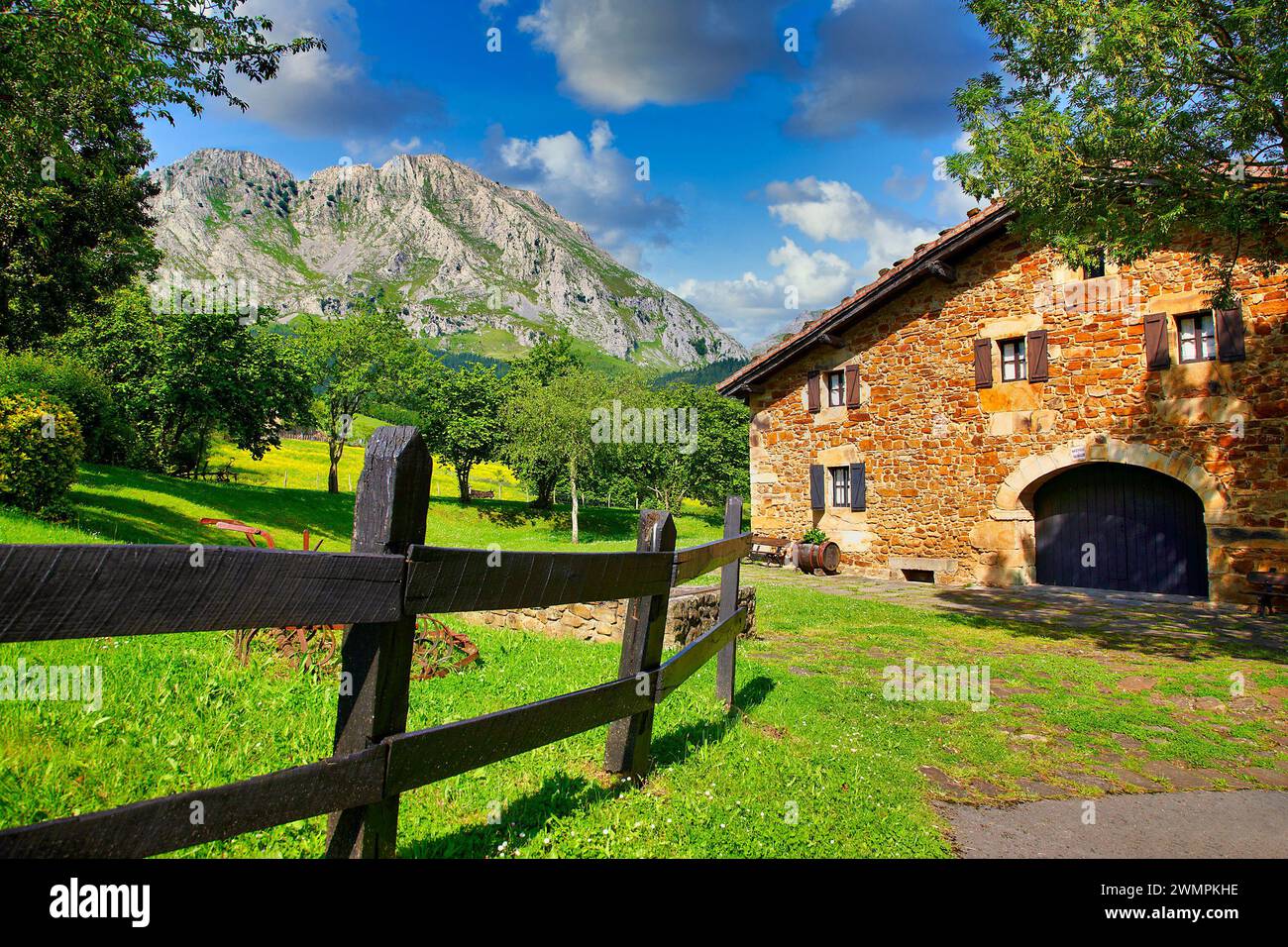 Mount Amboto and rural house, Axpe, Valley of Atxondo, Biscay, Basque Country, Spain Stock Photo