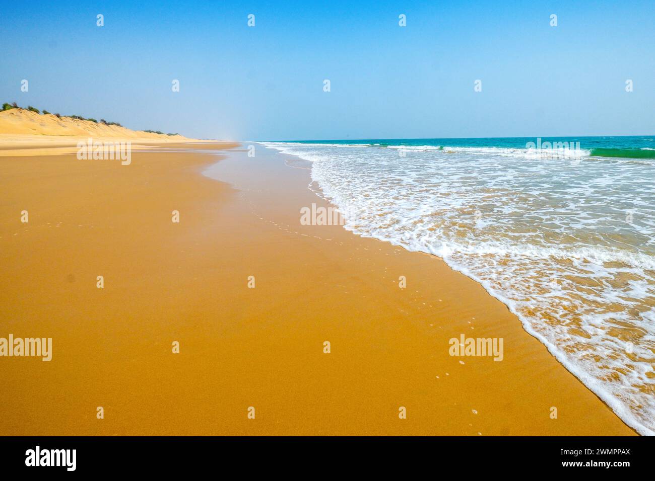 A long stretch of empty beach near Puri on the Orissa / Odisha coast of India Stock Photo