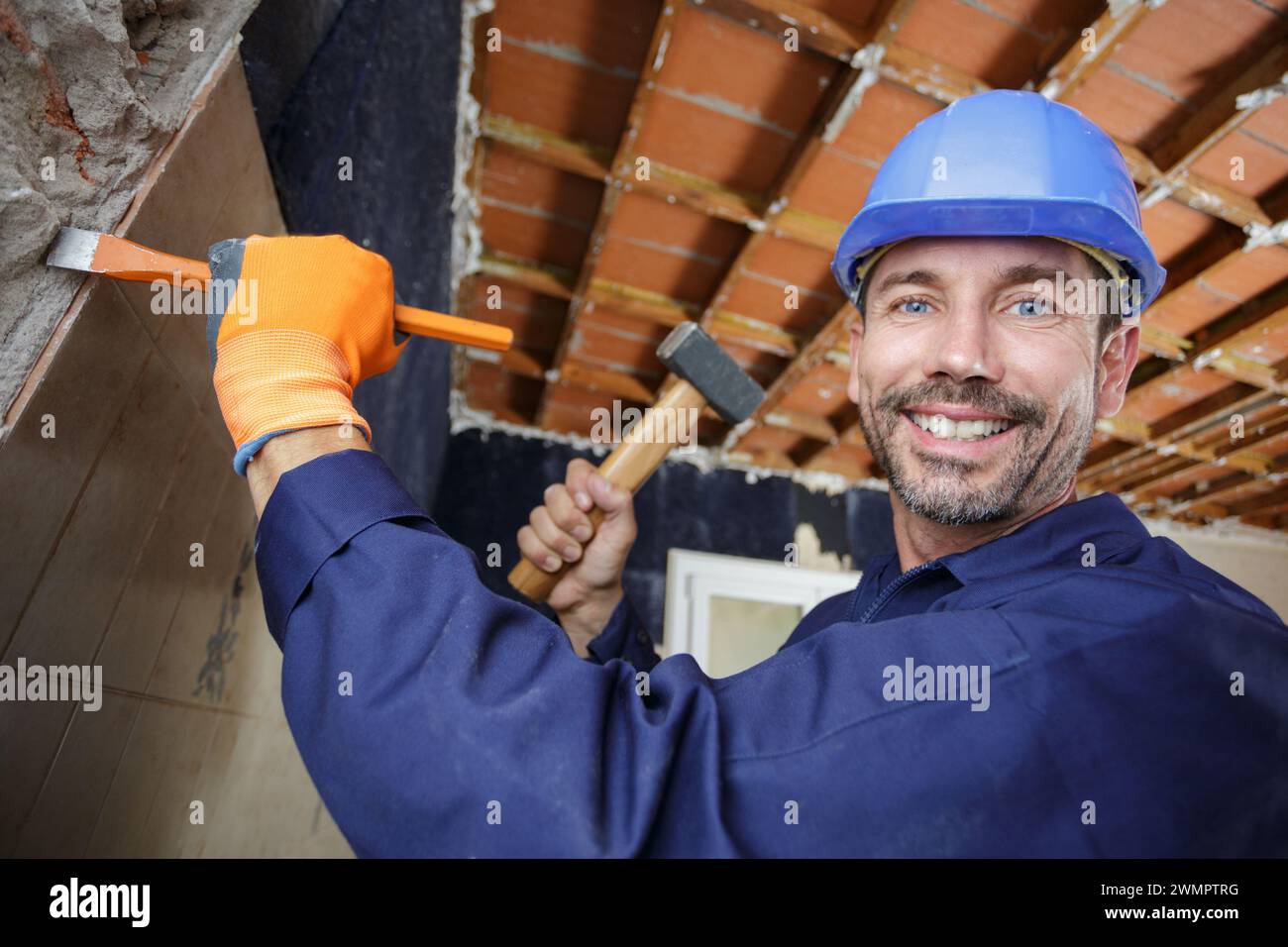 Cheerful male builder using hi-res stock photography and images - Alamy