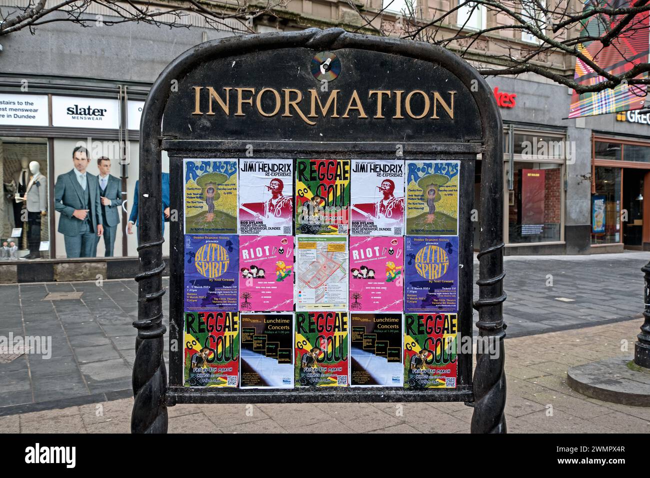 Infornation boar on high street advertising upcoming music events in