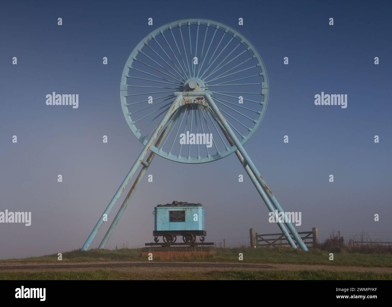 Pit wheel memorial Apedale blue sky Stock Photo Alamy