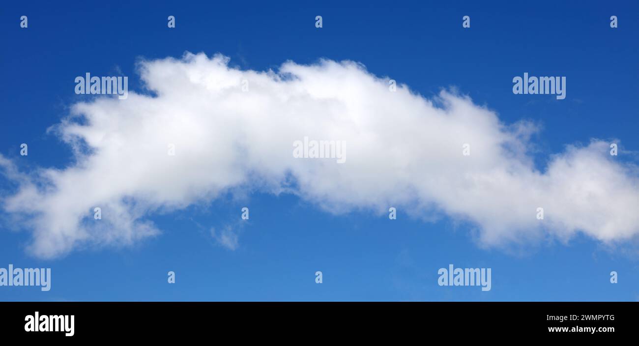 Fluffy white cloud in a blue sky Stock Photo