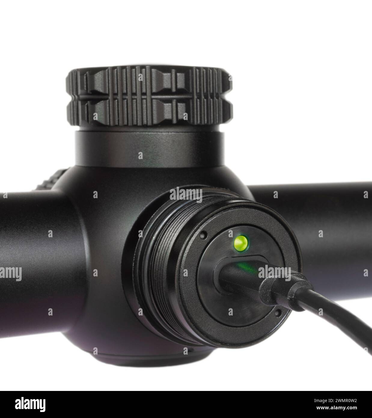 Infrared telescopic rifle sight used to shoot in the dark being recharged Stock Photo