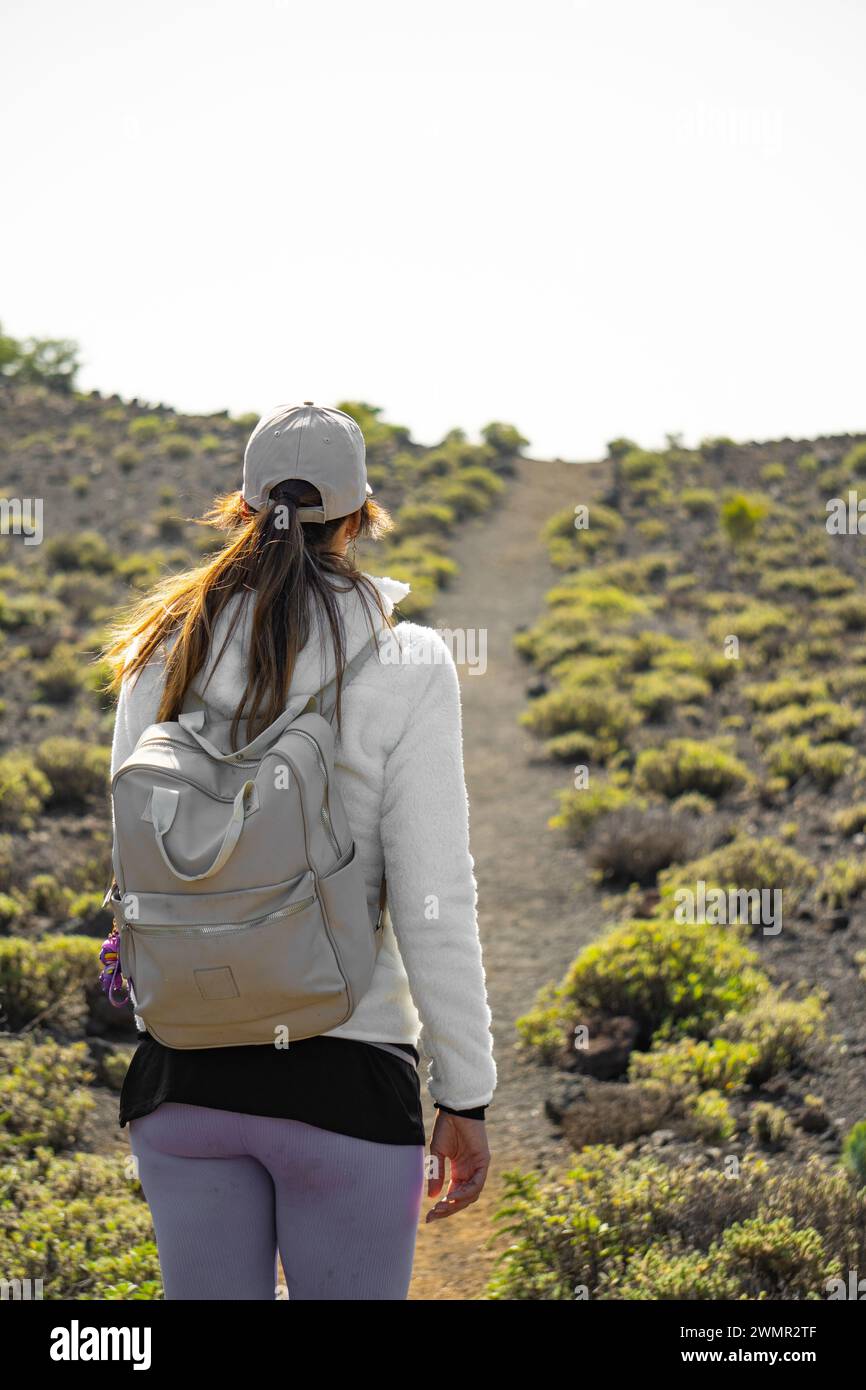 Active woman trekking along hi-res stock photography and images - Alamy