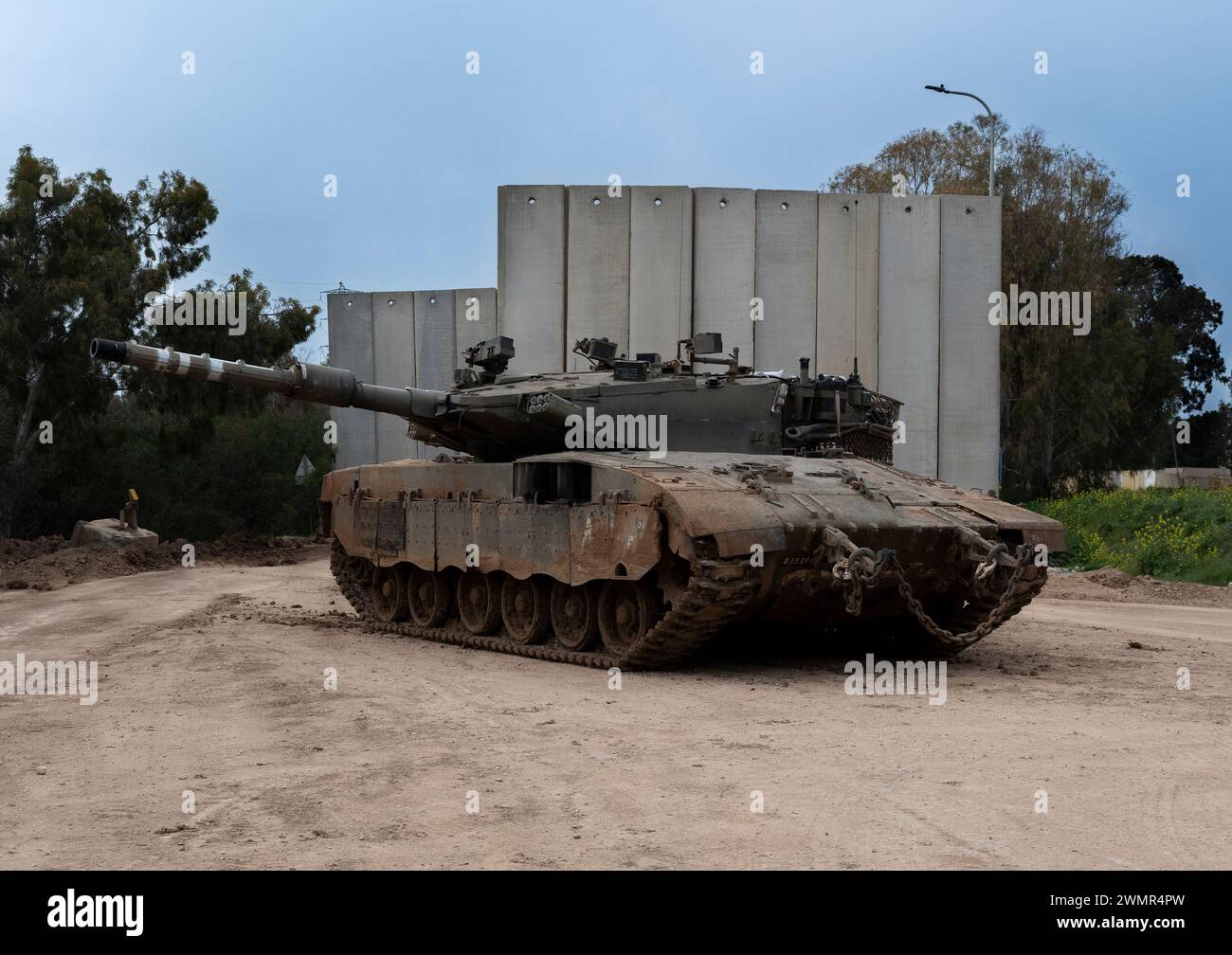 Southern Israel, Israel. 27th Feb, 2024. An Israeli tank parked near a protective wall inside southern Israel near the border with the Gaza Strip on February 27, 2024. Israel is awaiting an additional hostages for prisoner swap as well as a reported six week ceasefire in its war with Hamas, which is being negotiated amid signs it could happen in the coming week, according to US President Joe Biden. Photo by Jim Hollander/UPI Credit: UPI/Alamy Live News Stock Photo