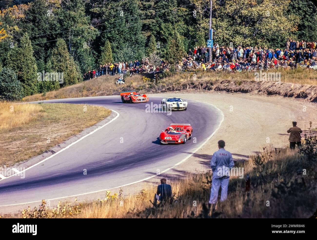 Chuck Oarsons in a McLaren Elve Mark II ahead of two other cars in Moss Corner at the 1966 Can-Am at Mosport Park in Canada, started   , finished Stock Photo
