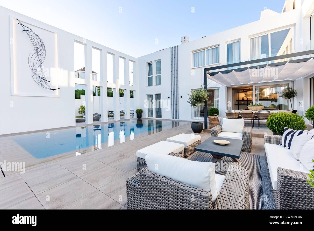 a backyard image in luxury Mediterranean mansion of an infinity ...