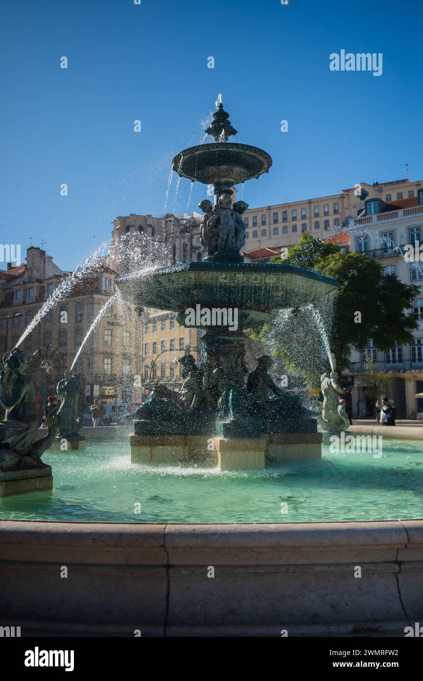 The monumental fountains of Rossio at Pedro IV Square in Lisbon, Portugal Stock Photo