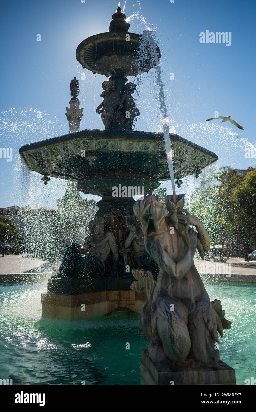 The monumental fountains of Rossio at Pedro IV Square in Lisbon, Portugal Stock Photo