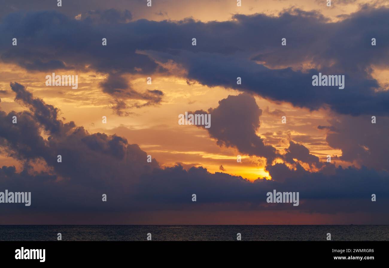 Colorful tropical sky over the ocean on a sunset, natural background ...