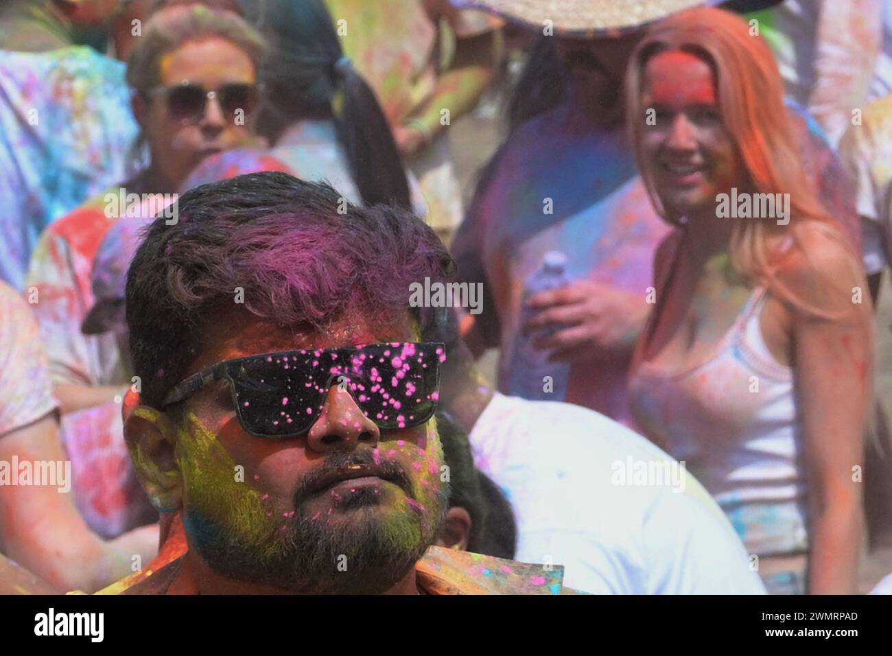 who organizes the holi festival