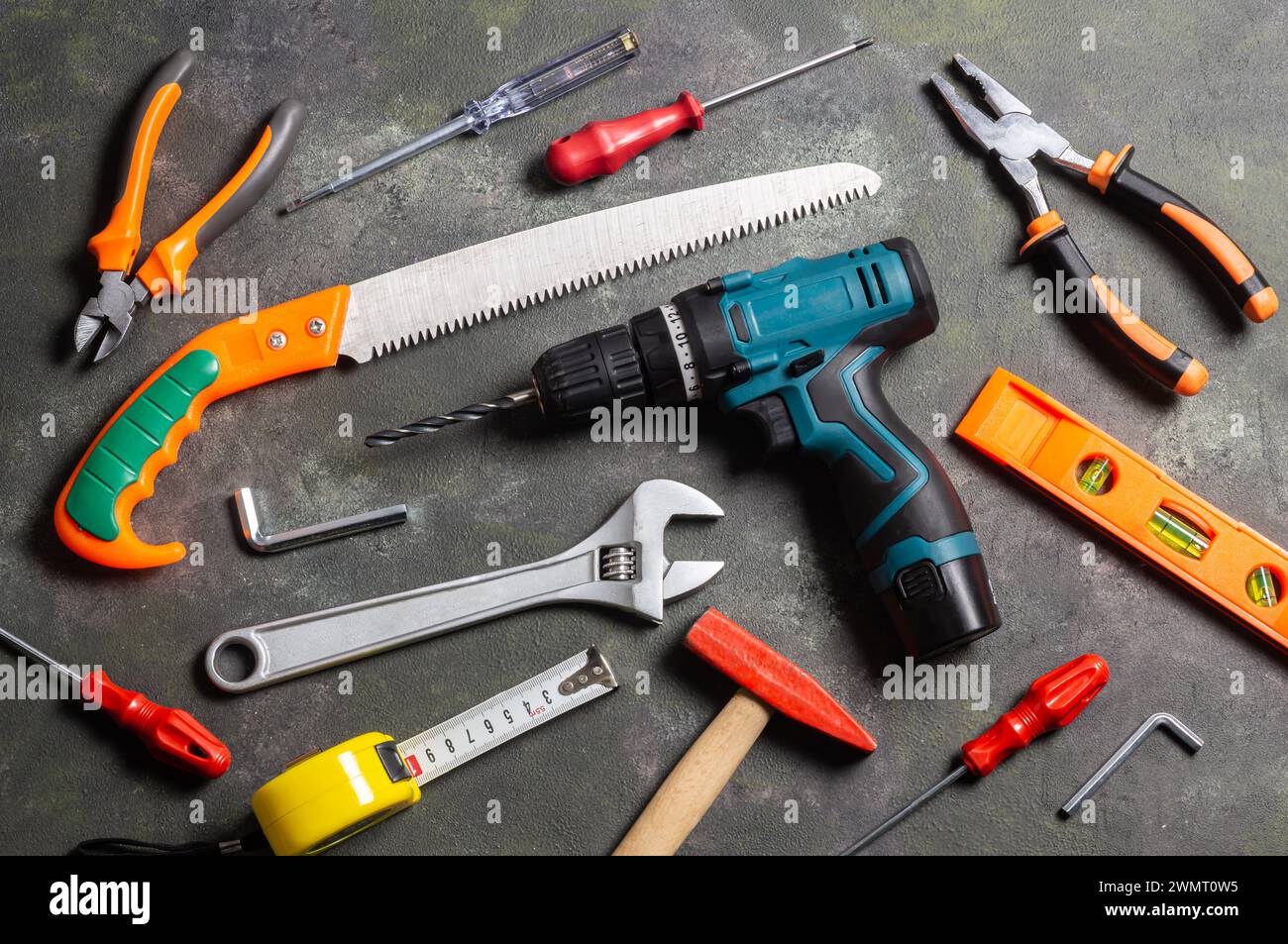 Various repair tools, hardware materials, drill, hammer, pliers, screwdriver, wrench Stock Photo