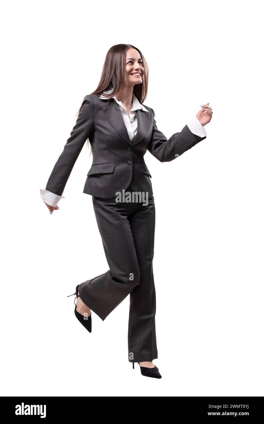 Businesswoman in a hurry running isolated on white background. A woman ...