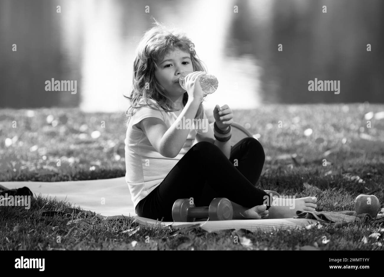 Kid Eating Healthy Food Drinking Water After Exercise Stock Photo Alamy Kid eating healthy food drinking water after exercise stock photo alamy