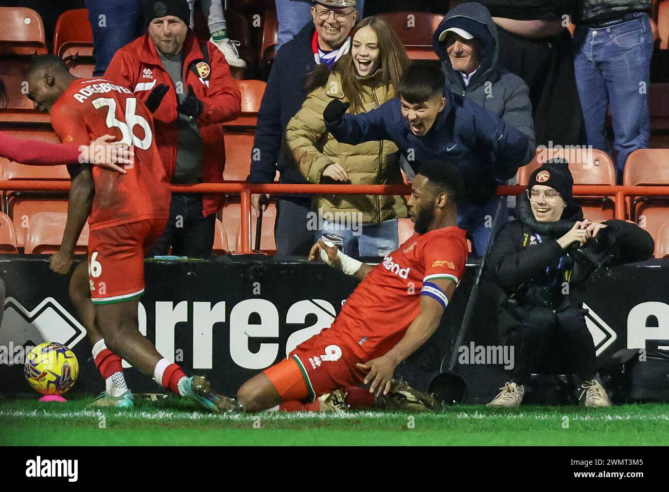 Walsall, UK. 27th Feb, 2024. Walsall's captain, Jamille Matt slides