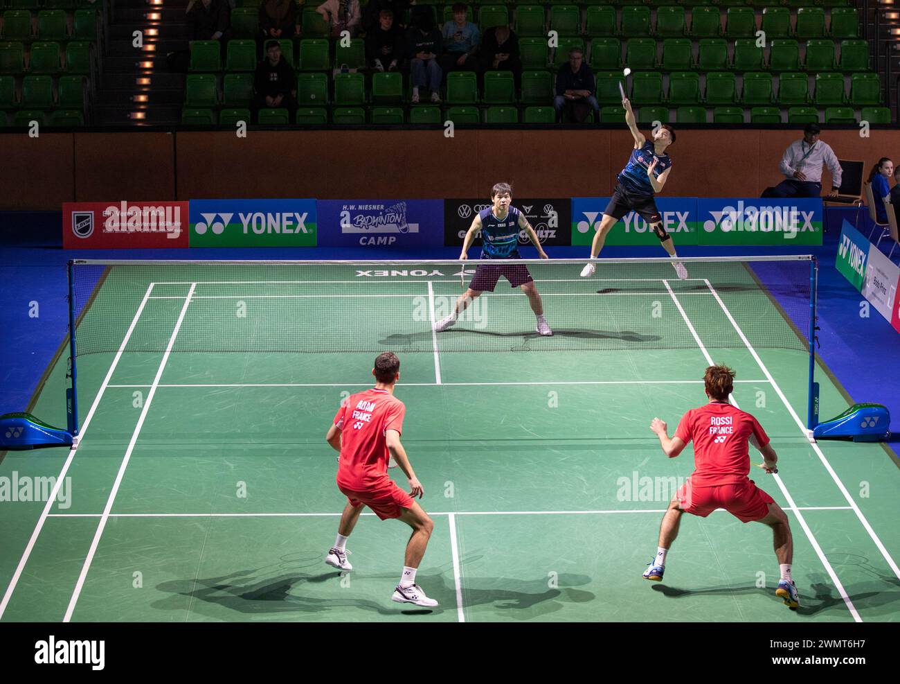 Muelheim, Germany. 27th Feb, 2024. Ong Yew Sin (Top, R)/Teo Ee Yi of Malaysia compete during the men's doubles first round match between Ong Yew Sin/Teo Ee Yi of Malaysia and Eloi Adam/Leo Rossi of France at Yonex German Open 2024 badminton tournament in Muelheim, Germany, Feb. 27, 2024. Credit: Zhang Fan/Xinhua/Alamy Live News Stock Photo