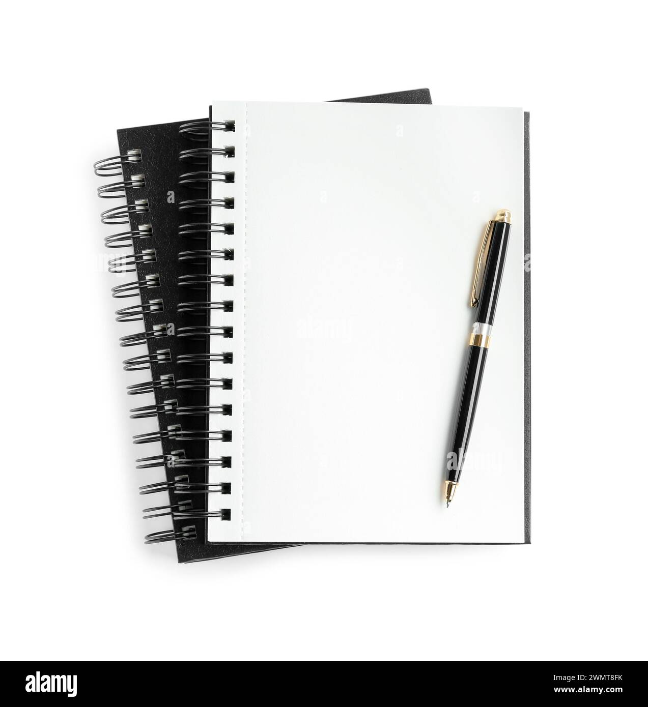 Two notebooks and pen isolated on white, top view Stock Photo